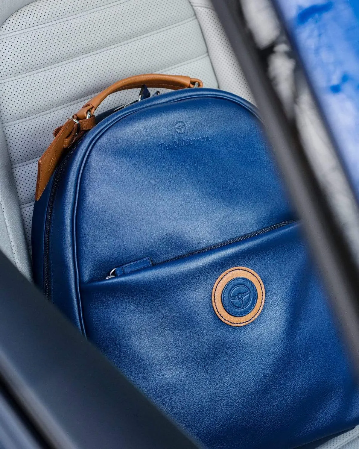 GLOBETROTTER - Full-grain Leather Backpack - Blue/Tan